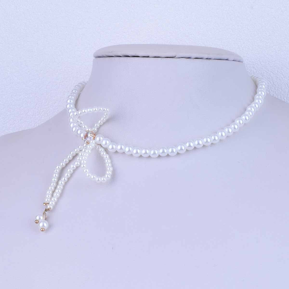UNI-10509 -  Pearly Bow - Necklace