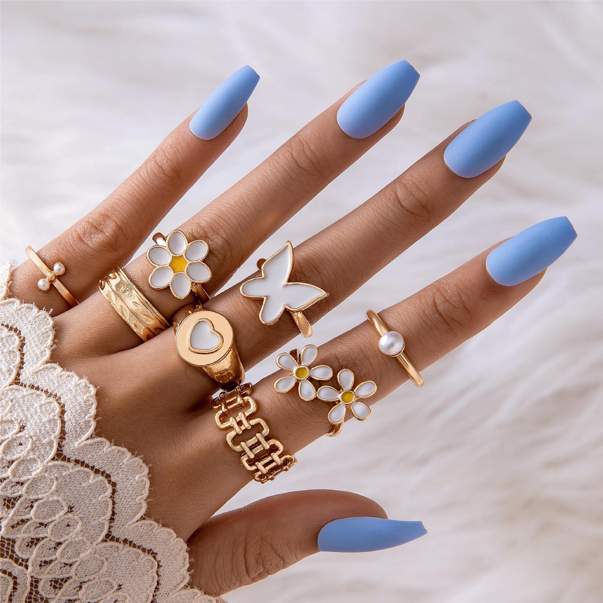 UNI-10776-1 - White Flower  & Cuties Gold - Ring Set Of 8